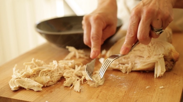 Shredding Roasted Chicken with a fork