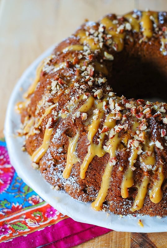 Apple Pumpkin Bundt Cake with Caramel Drizzle and Chopped Pecans