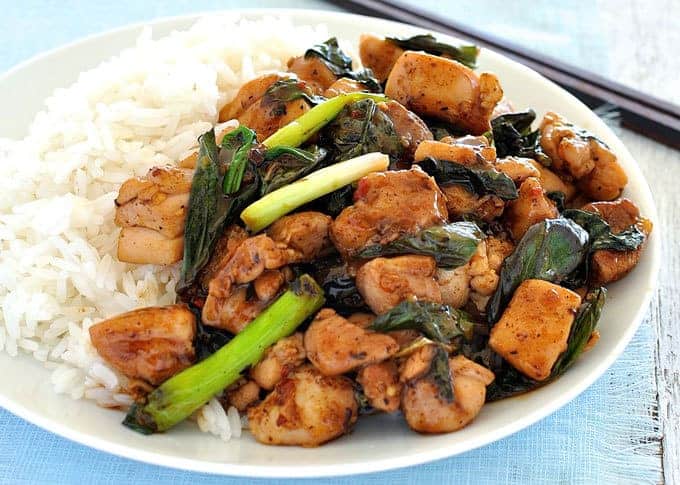 Thai Chilli Basil Chicken stir fry on a plate with rice