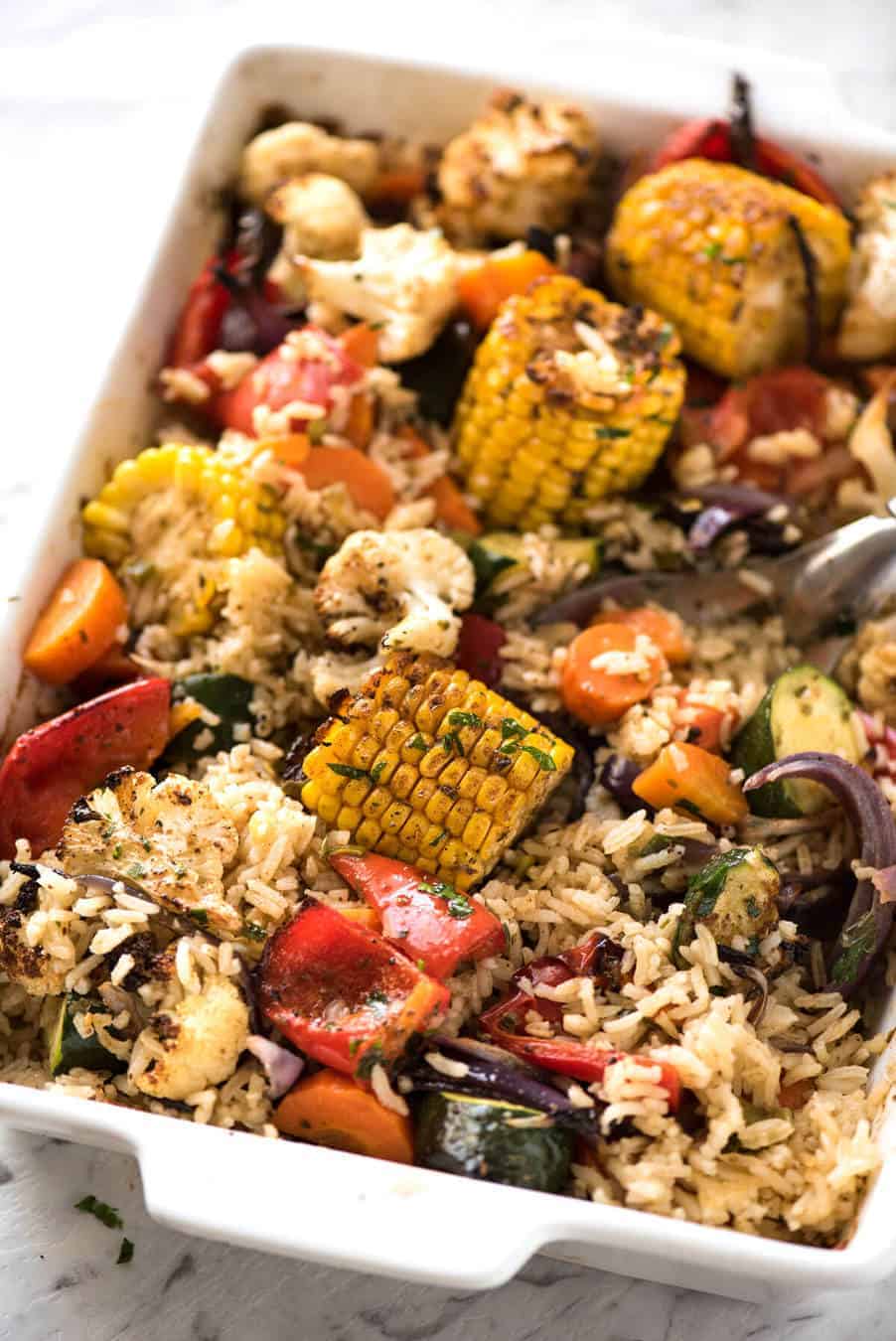 Oven Baked Rice and Vegetables - Fluffy seasoned rice and oven roasted vegetables, all made in ONE pan! Fabulous meal or side, super quick and easy to prep. recipetineats.com