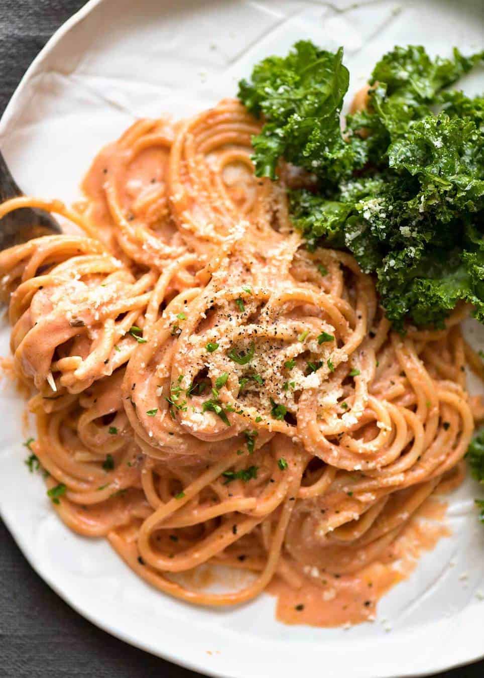 Creamy Tomato Pasta - a less guilty way to get your creamy pasta fix, this luscious sauce is made with tomato, milk, parmesan, garlic and cream.